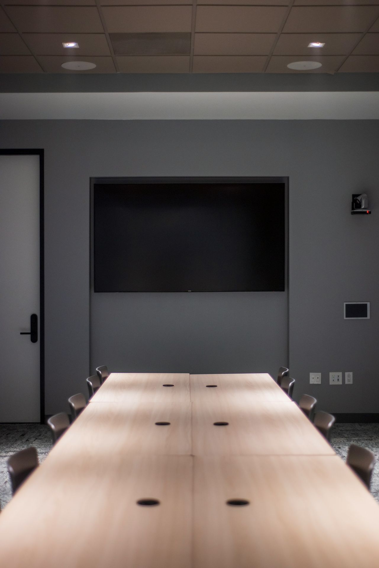 black flat screen tv on white wall